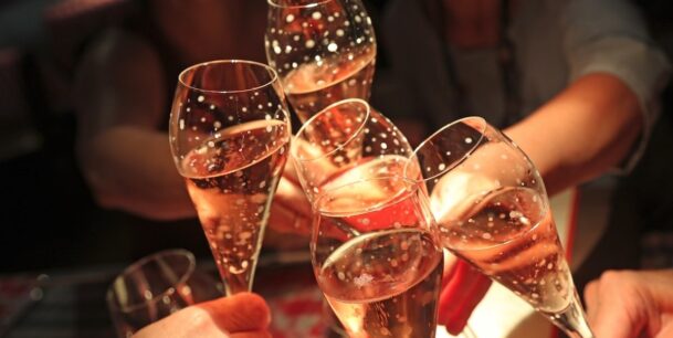 Prosecco glasses raised